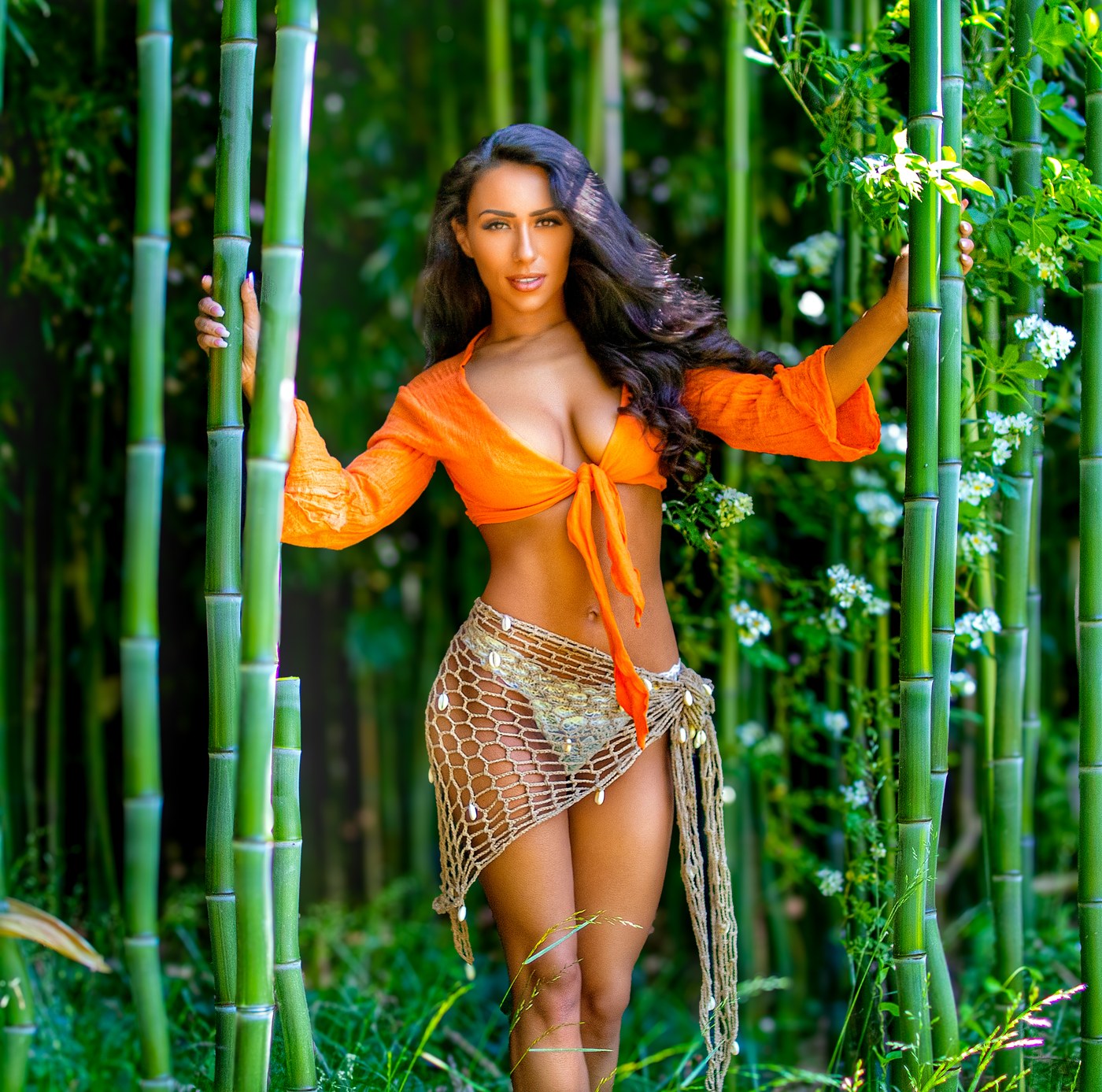 Boudoir portrait framed by bamboo by Mo Bella Photography
